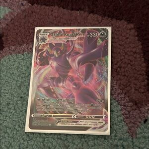 Pokemon Grimmsnarl VMAX Trading Card - Purple and Pink